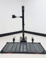 Wheelchair Carrier Lift n Go Model 210 electric lift with platform lowered in studio